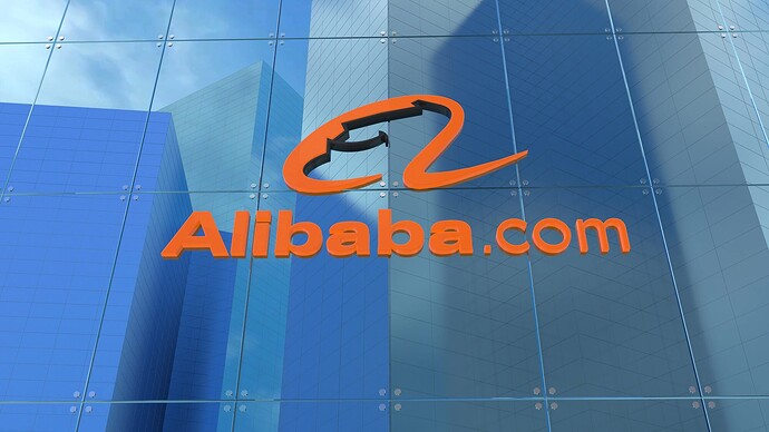 Glasfassade mit Alibaba Logo und Schriftzug