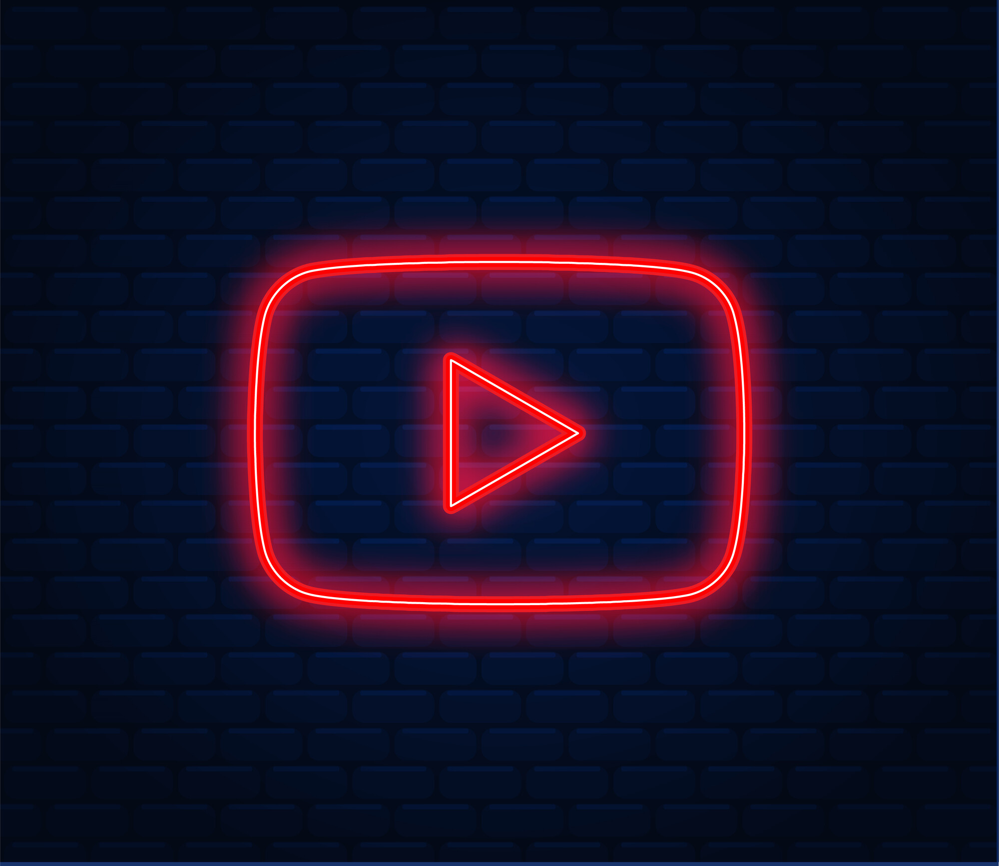 Ein leuchtender YouTube-Button vor einer Mauer