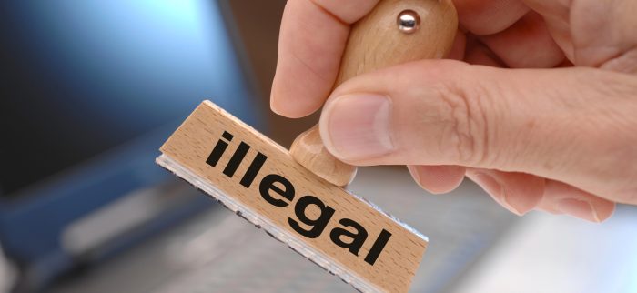 Ein Stempel mit der Aufschrift "Illegal".