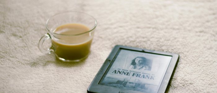 e-book reader, cup of coffee