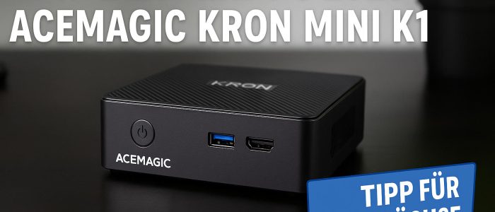 Symbolfoto eines kompakten ACEMAGIC Kron Mini K1 Mini-PCs auf einem Schreibtisch-Setup mit Monitor und Tastatur. Er überzeugt durch sein modernes Design und seine optimierte Leistung und ist ein Tipp für Sparfüchse.