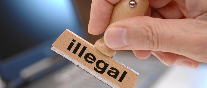 Ein Stempel mit der Aufschrift "Illegal".