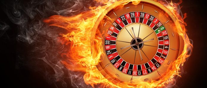 Ein Casino-Roulette-Rad in Flammen