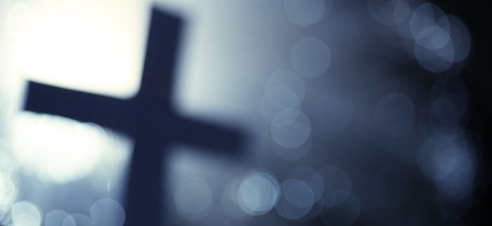 Ein abstraktes Kreuz (symbolisch für den Weltkirchenrat)