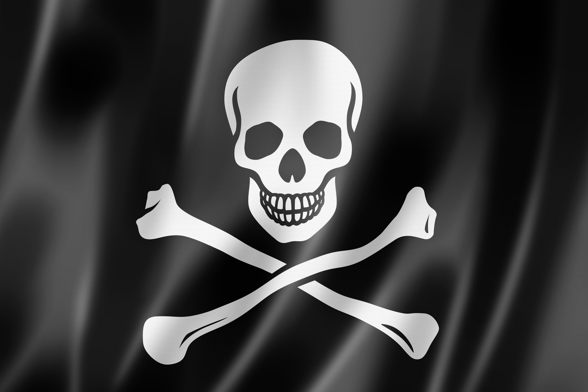 Eine Piratenfahne weht in der Glosse der Tarnkappe (Symbolbild)